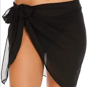 Black bathing suit coverup. Very light weight.
